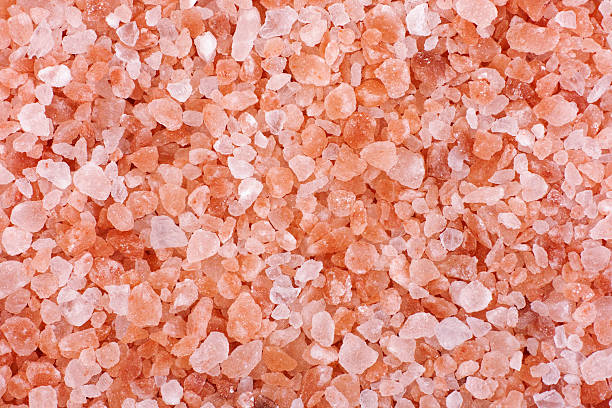 Pink himalayan salt Pink himalayan salt background. Close up. himalayas stock pictures, royalty-free photos & images