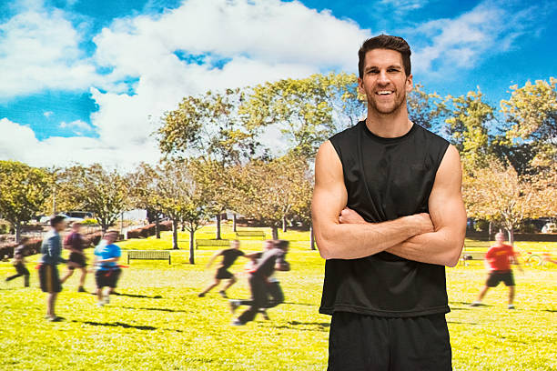 Sportsman standing in park