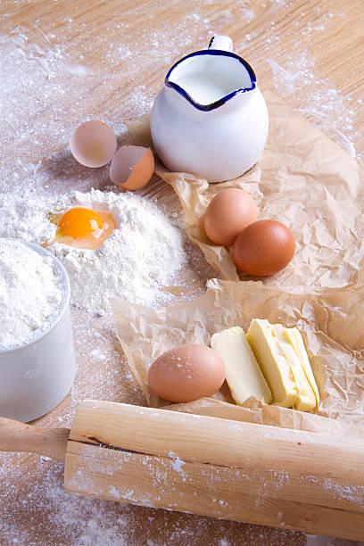 istock Dough recipe ingredients on wood table. 519787076