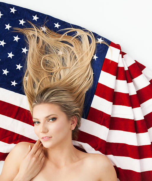istock Woman lying over US flag 519789166
