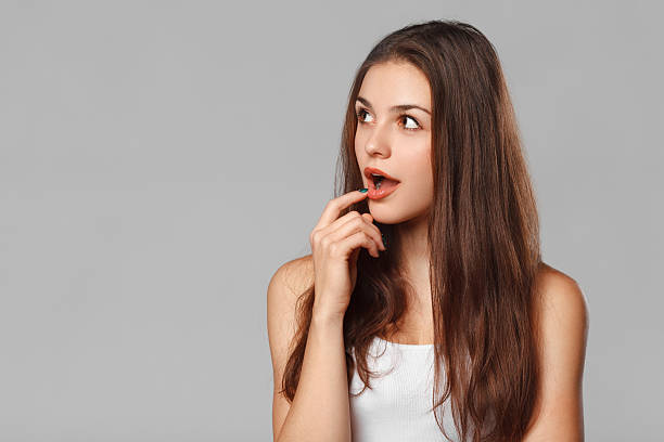 istock Surprised happy woman looking sideways in excitement, isolated 519791796