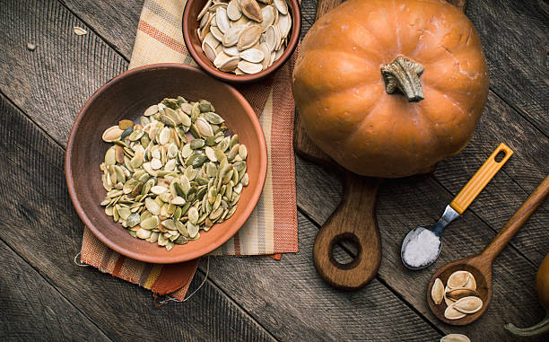 istock Rustic style pumpkins with seeds on wood 519793774