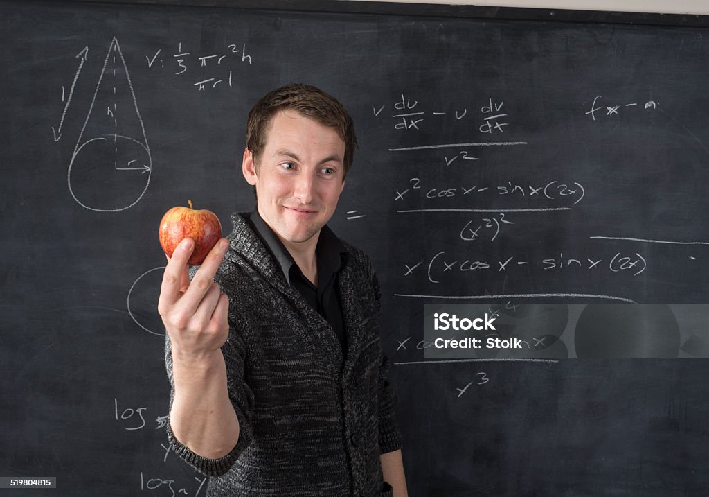 Red apple A Caucasian male  teacher in front of the classroom Adult Stock Photo