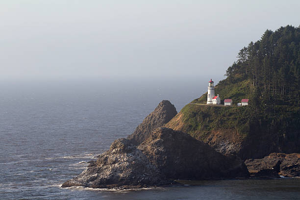 istock Lighthouse on a foggy day 519805345
