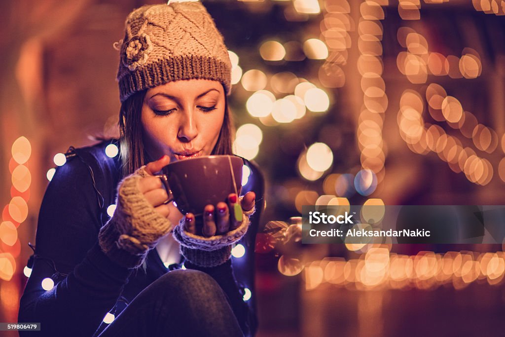 Warm drink on a winter night Adult Stock Photo