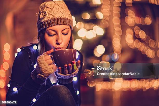 Warm Drink On A Winter Night Stock Photo - Download Image Now - Adult, Adults Only, Blowing