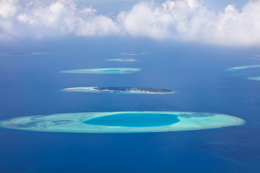 Aerial view on beautiful Maldives islands in Raa atol