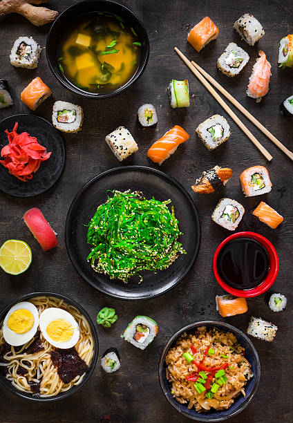 istock Table served with sushi and traditional japanese food 519822098