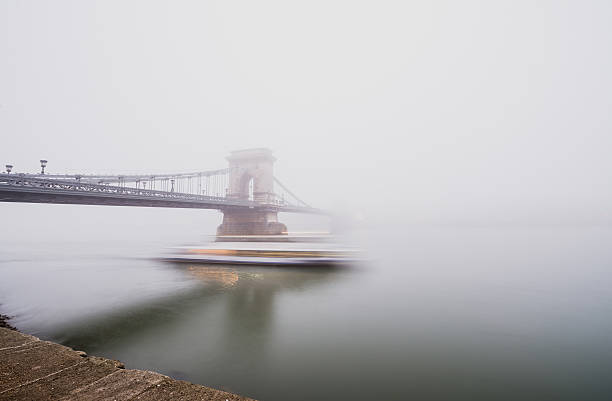 istock Chain Bridge over the Danube and a boat, Budapest, Hungary 519823328