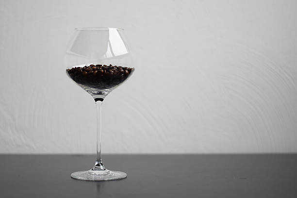 istock Coffee beans in wine glass 519823586