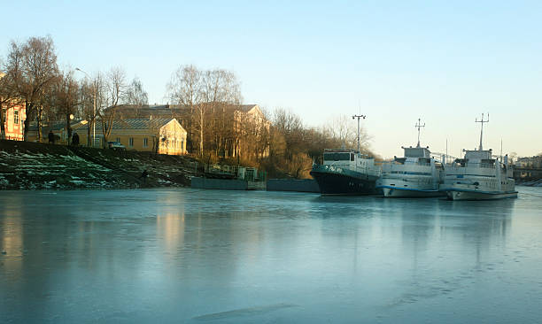 istock ships on the frozen river, boat parking 519824513