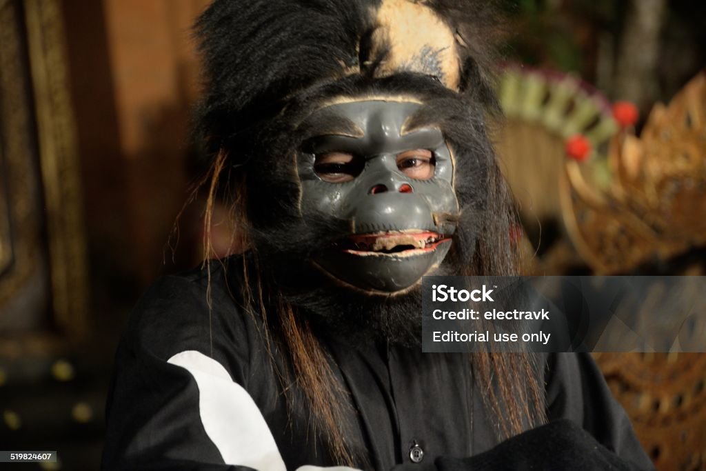 Barong Dance Bali, Indonesia - September 12, 2014: A masked performer during a traditional Balinese Barong dance. Adult Stock Photo