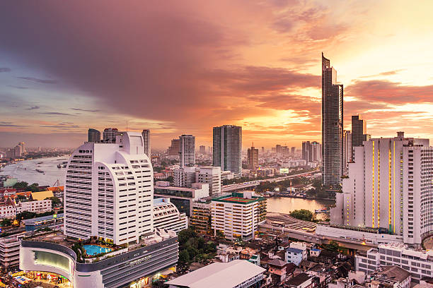 istock modern cityscape of mangkok with sunset 519824763