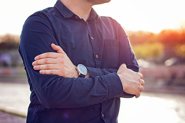 istock Close-up Crossed Hands and Watch 519825172