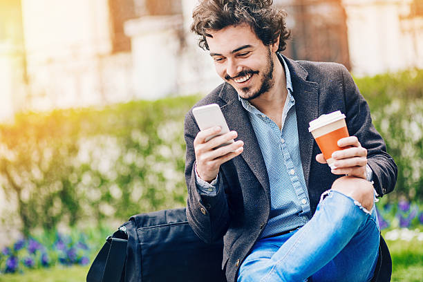 istock Text messaging and enjoying the green outdoors 519827442