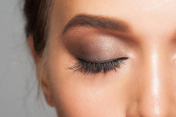 Eye makeup Closeup image of closed woman eye with beautiful bright makeup, smoky eyes eyeshadow stock pictures, royalty-free photos & images
