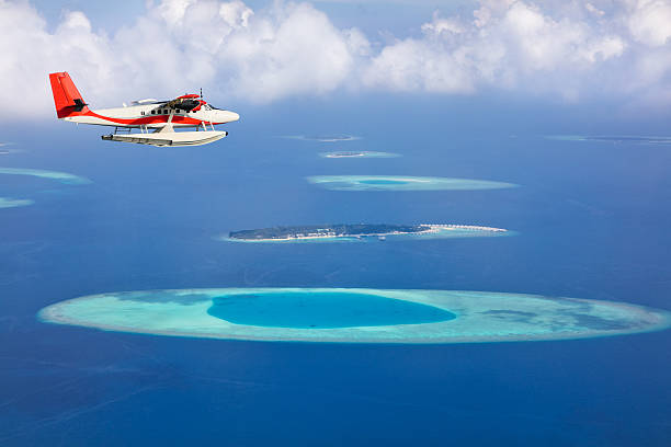 istock Sea plane flying above Maldives islands 519828908