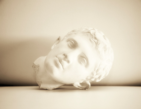 Old plaster cast of a 19th century clay copy of a classical Roman or Greek statue.