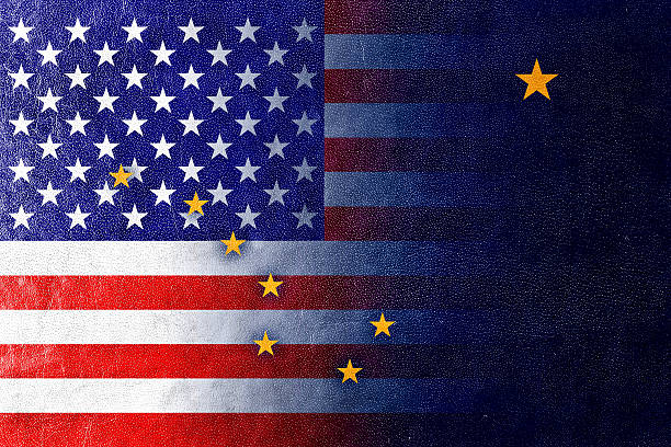 USA and Alaska State Flag painted on leather texture stock photo