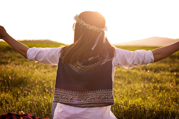 istock Amazing Sunset and Hippie Girl 519831580