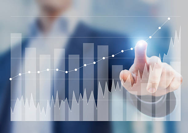 istock Expert businessman using business intelligence to sketch success on charts 519831592
