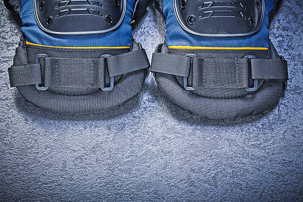 istock Pair of knee protectors on black background construction concept 519834966