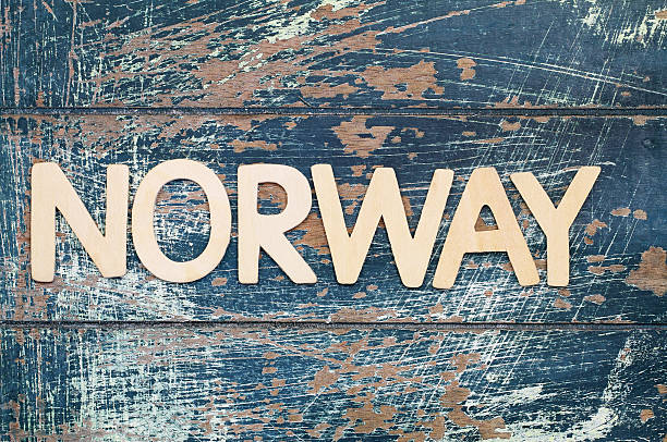istock Norway written with wooden letters on rustic surface 519837362