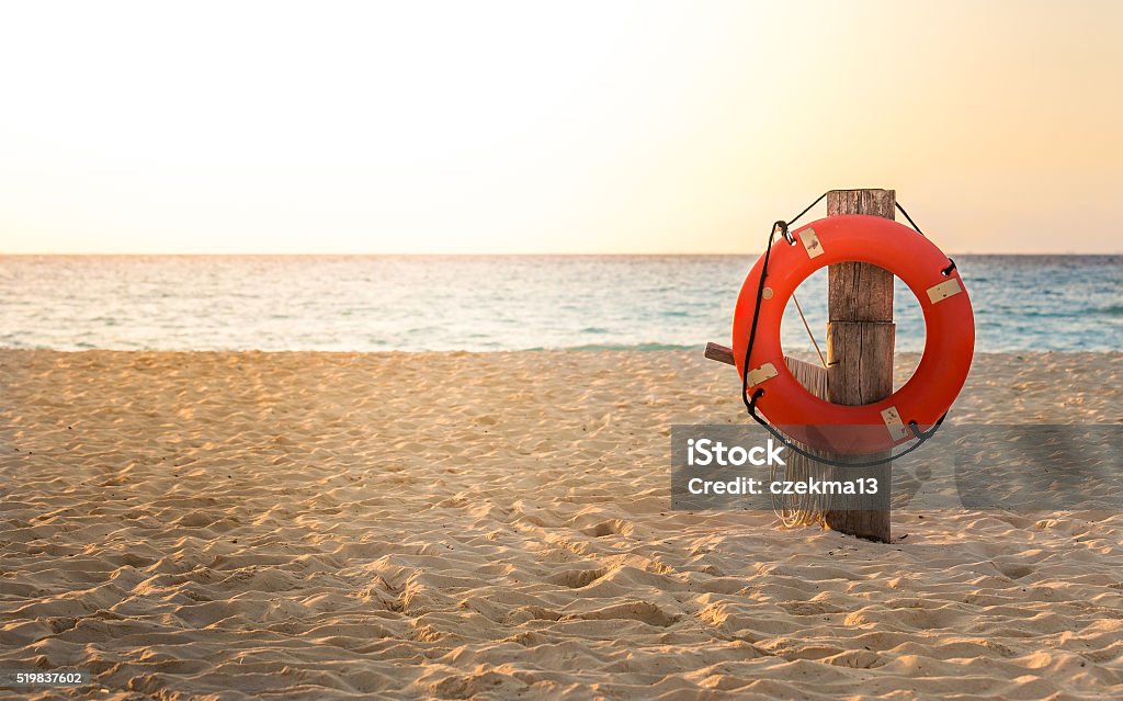 Life preserver on sandy beach Life preserver on sandy beach somewhere in Mexico Life Belt Stock Photo