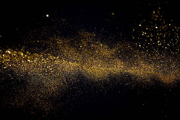 waving golden glitter