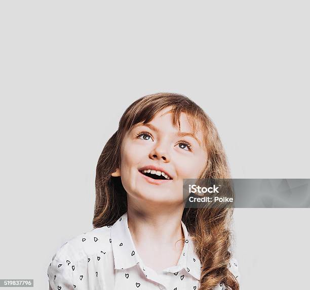 Funny Little Girl Portrait Stock Photo - Download Image Now - Child, Looking Up, Girls