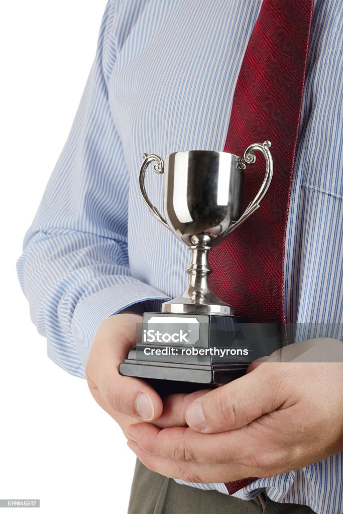 business award Man in shirt and tie holding a trophy cup isolate don a white background Achievement Stock Photo