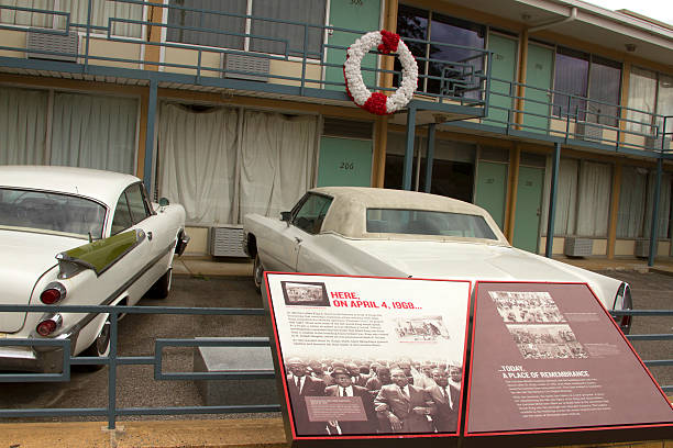 Rememberance to MLK at National Civil Rights Museum, Memphis Memphis, TN, USA - September 15, 2014 :  National Civil Rights Museum located in the old Lorraine Motel, site of the Martin Luther King, Jr assassination, in Memphis TN including the balcony on which he was shot preserved as it was on that date assassination photos stock pictures, royalty-free photos & images