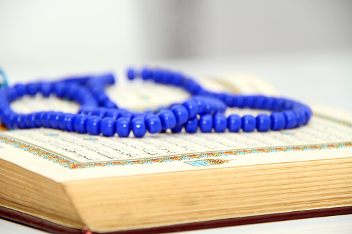 Photo of the prayer beads and Qoran