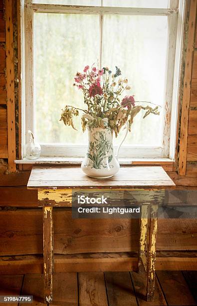 Rustic Cabin Dried Flowers Stock Photo - Download Image Now - Antique, Decoration, Dried Plant