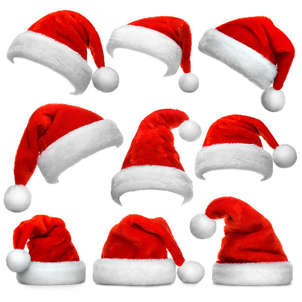 set of santa claus red hats isolated on white background - kerstmuts stockfoto's en -beelden