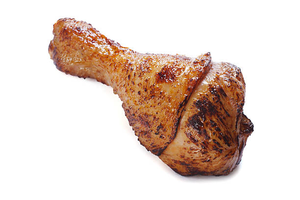 istock tasty fried chicken drumsticks isolated on white background 519849759