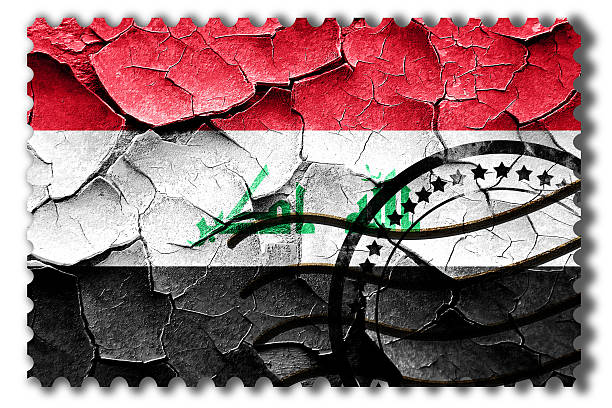 Grunge Iraq flag with some cracks and vintage look stock photo