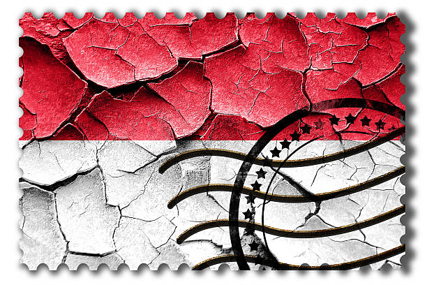 Grunge Indonesia flag with some cracks and vintage look stock photo