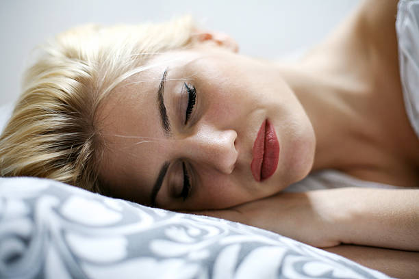istock Sensual blond woman sleeping in bed. 519860660