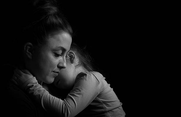 istock Mother and Dauhgter hugging 519860794