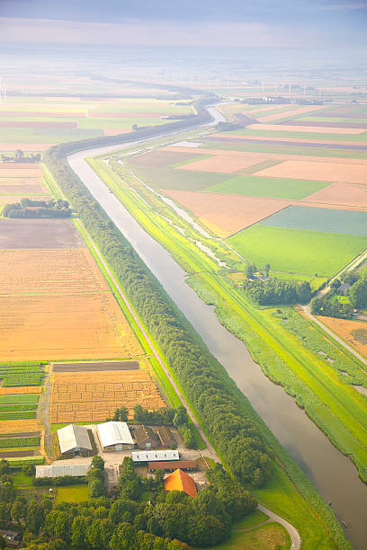 istock Dutch landscape with straight canal from above 519861034