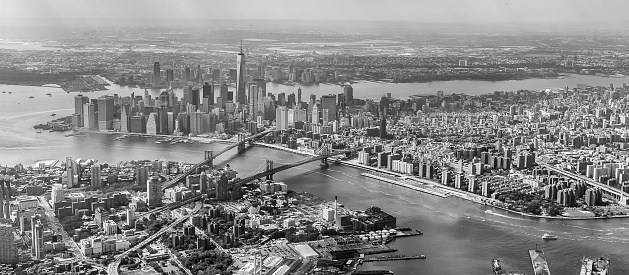 Aerial view of the beautiful city of Jacksonville Florida along the St. Johns River from an altitude of about 1000 feet over the river in black and white and toned in a light sepia for effect.