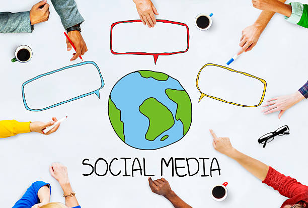 istock Hands on Table with Social Media Concept 519862271