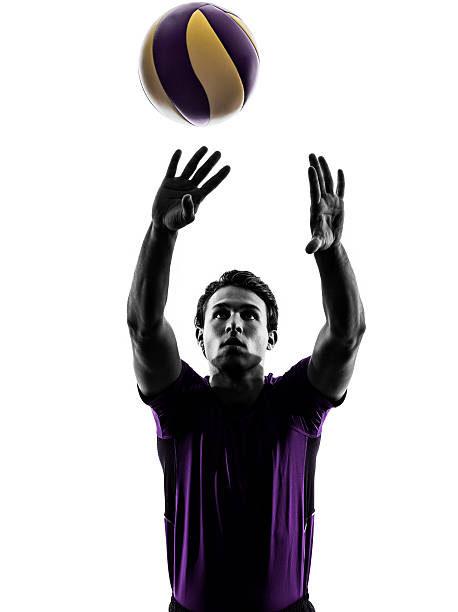 istock volley ball player man silhouette white background 519862813