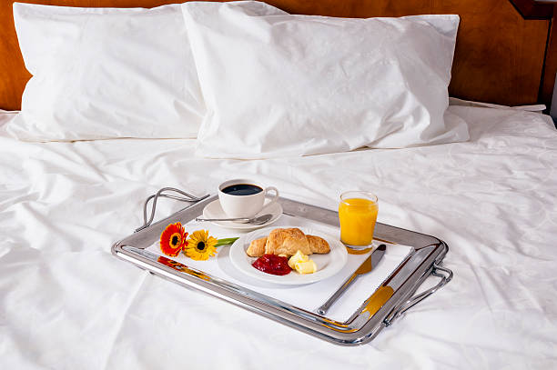 istock Breakfast in bed in hotel room. 519862977