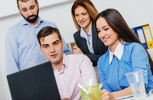 istock Business meeting with young professionals dealing with project challenges 519863718