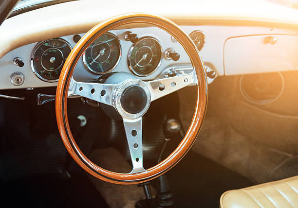 istock Oldtimer convertible vehicle interor with steering wheel and speedmeter 519864058
