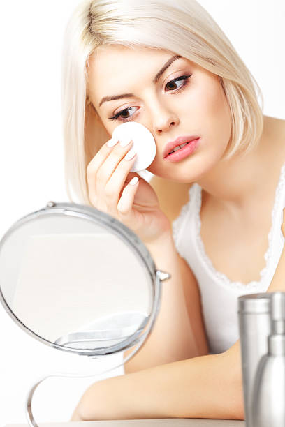 istock Makeup Applying. Beautiful Woman does Daily Makeup. 519865795