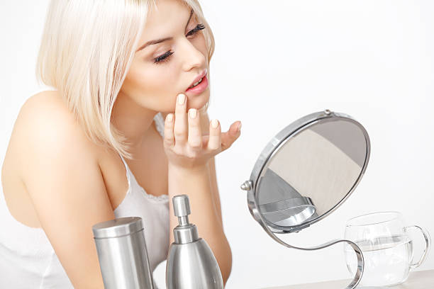 istock Makeup Applying. Beautiful Woman does Daily Makeup. 519865799