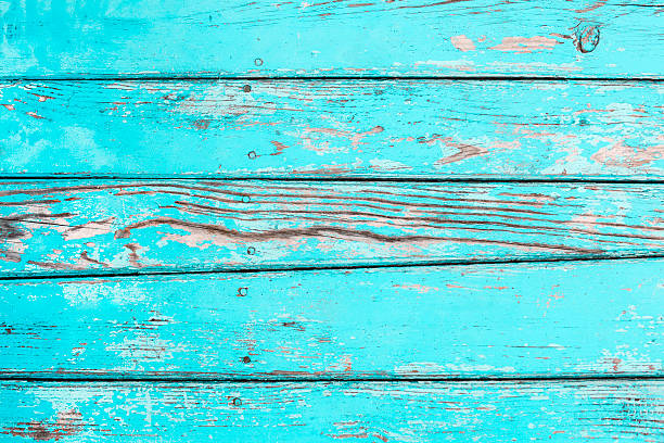 istock Wasted turquoise wooden background 519865871
